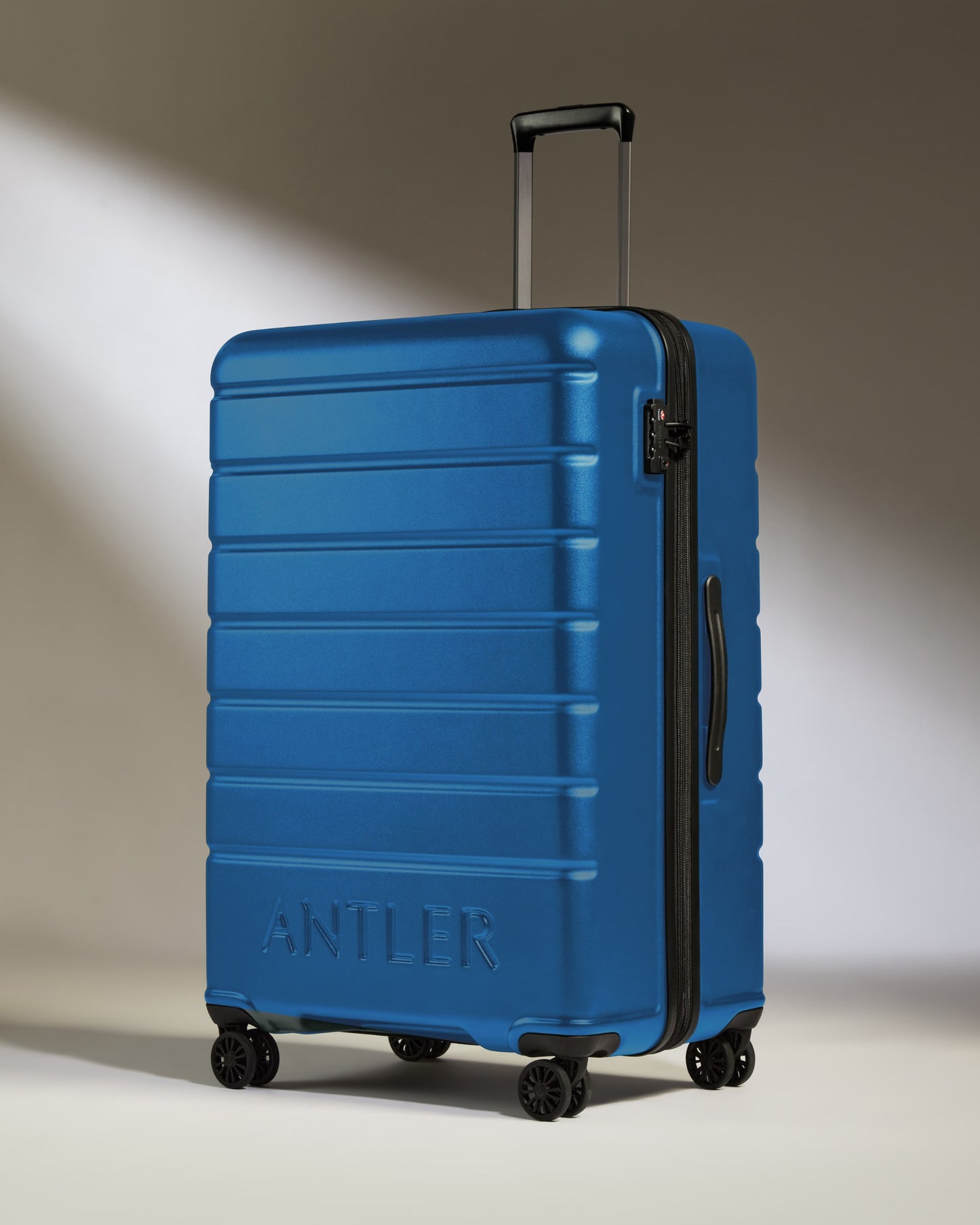 Large Luggage in Bold Blue - Logo