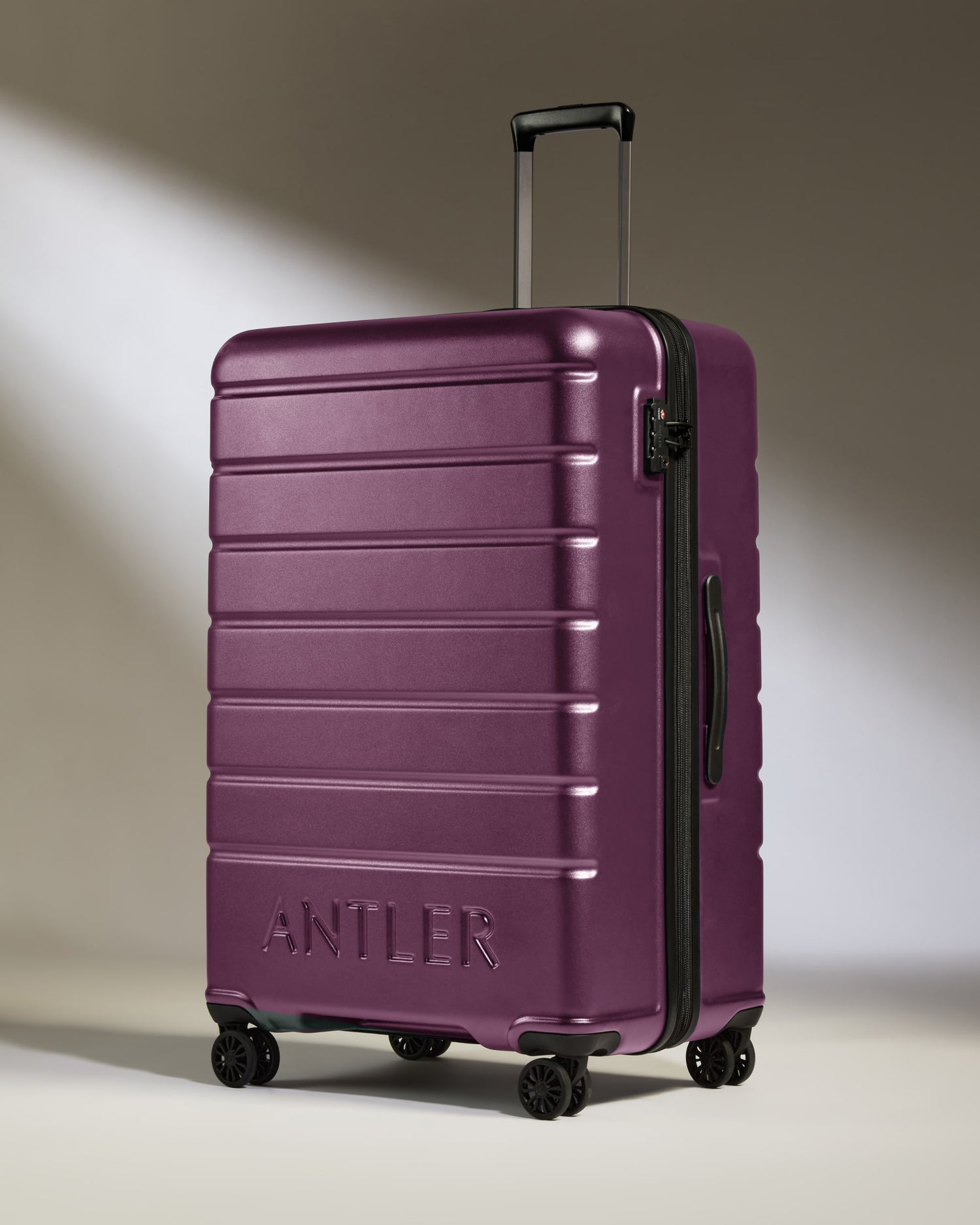 Large Luggage in Dark Heather Purple - Logo