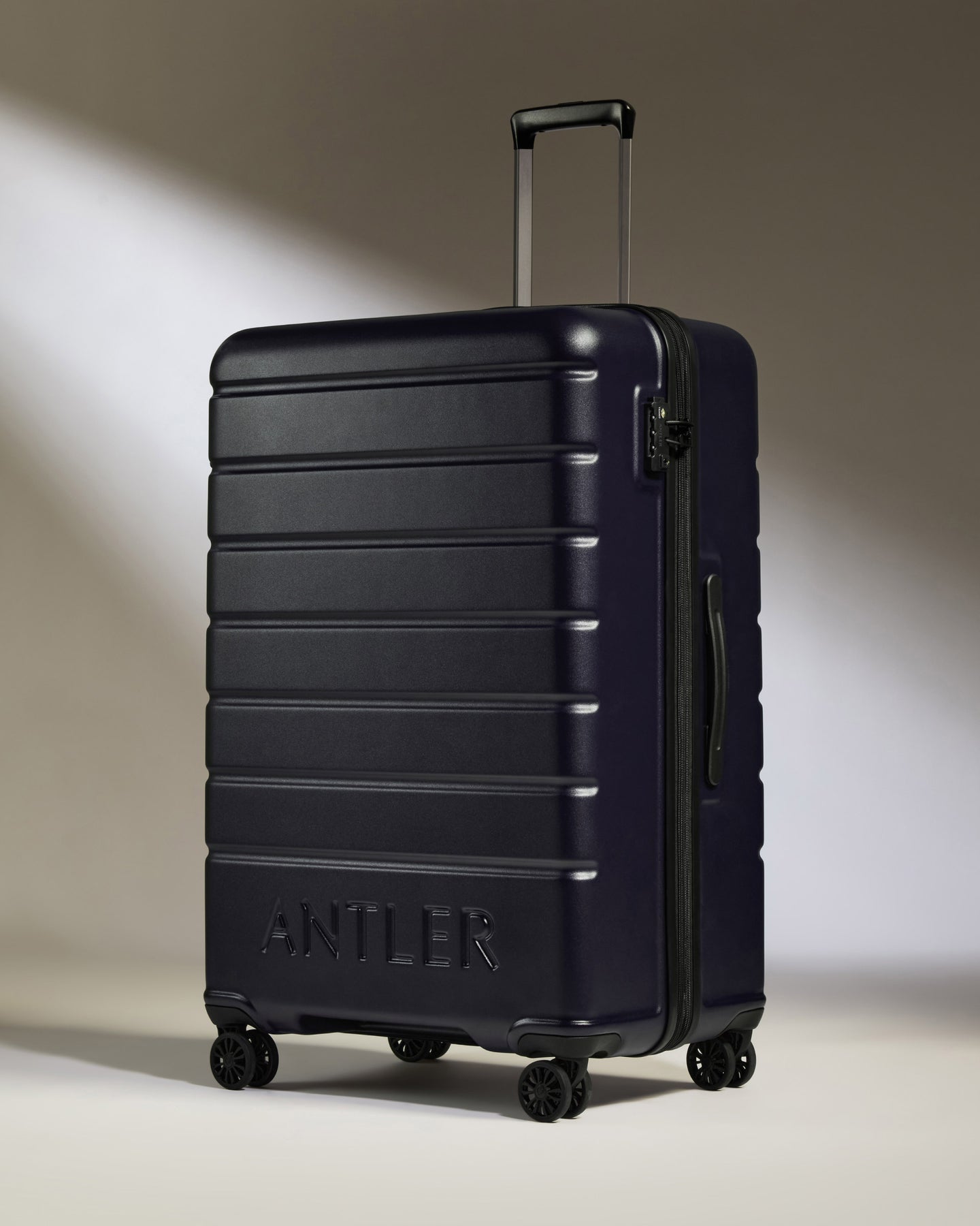 Large Luggage in Dark Purple - Logo