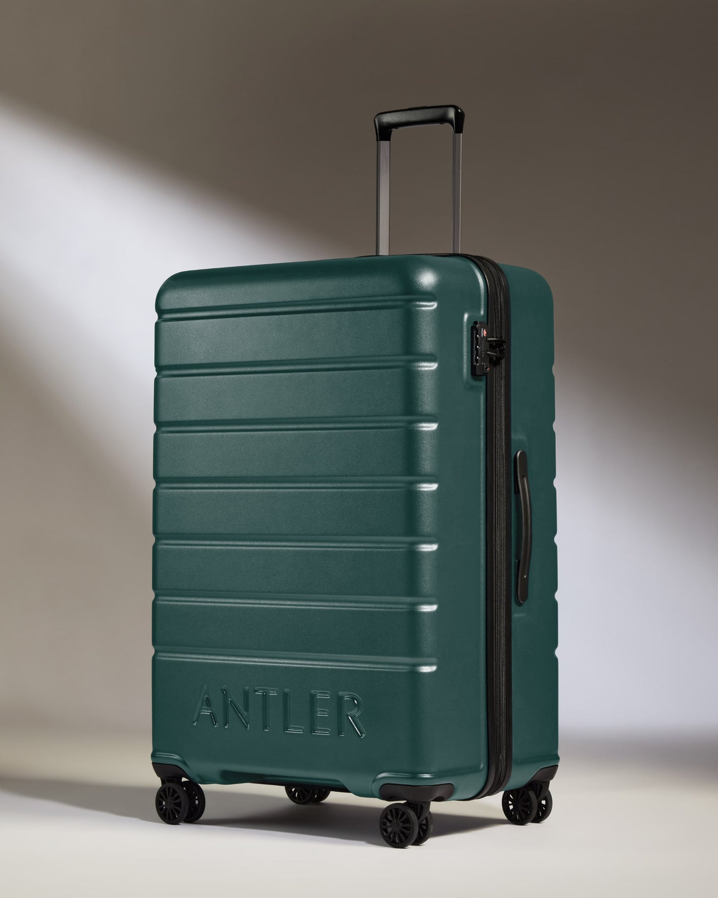 Large Luggage in Dark Teal - Logo