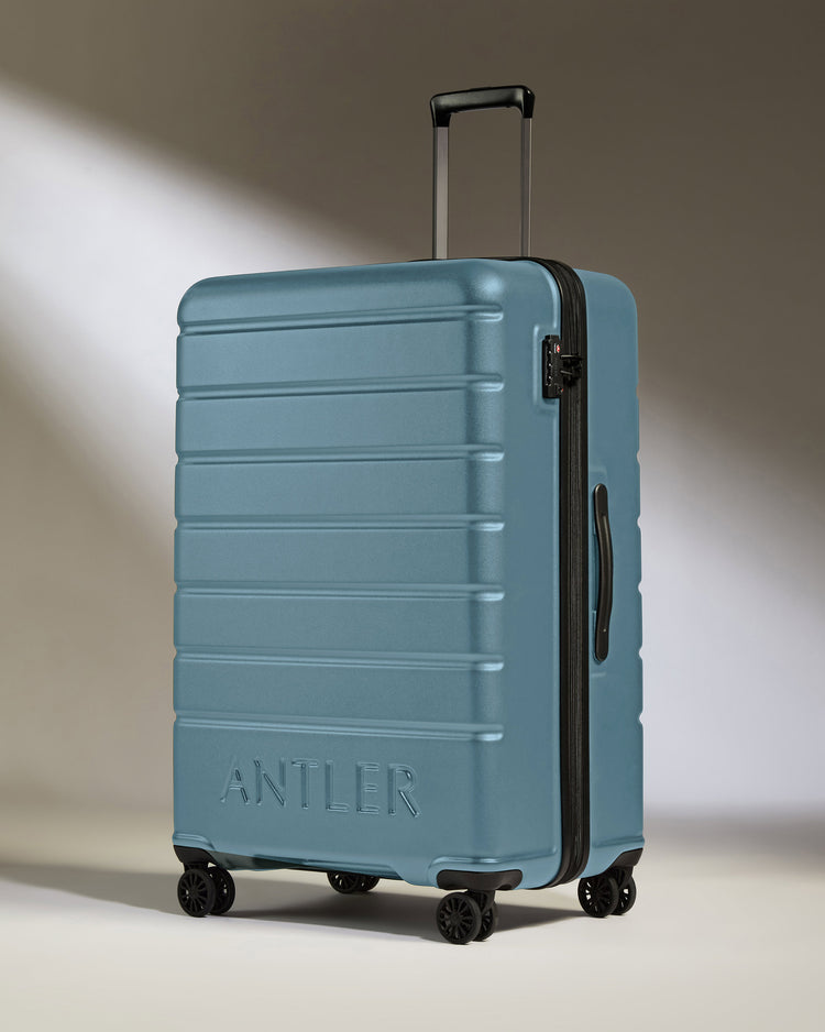 Large Luggage in Light Blue - Logo
