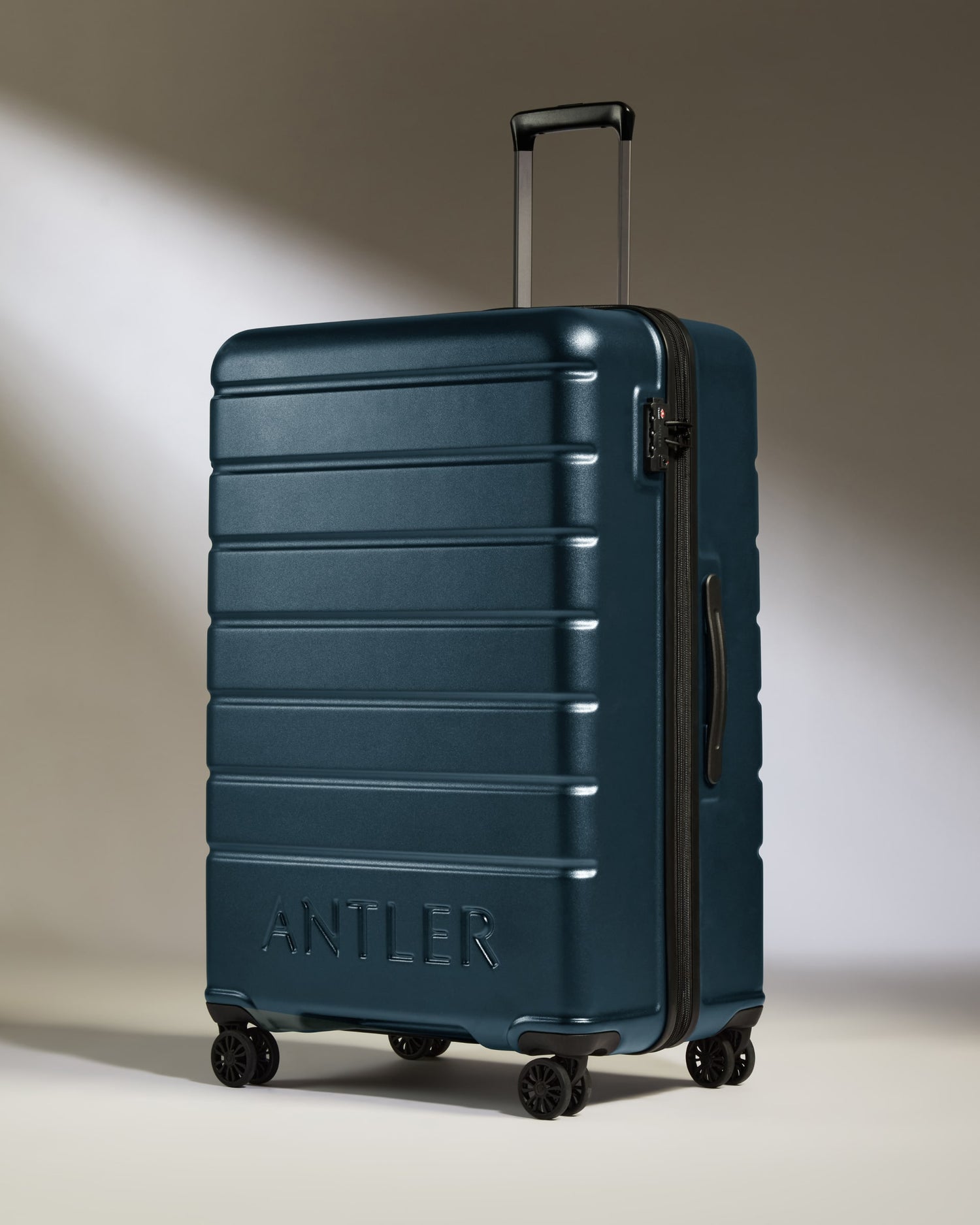Large Luggage in Mid Blue - Logo