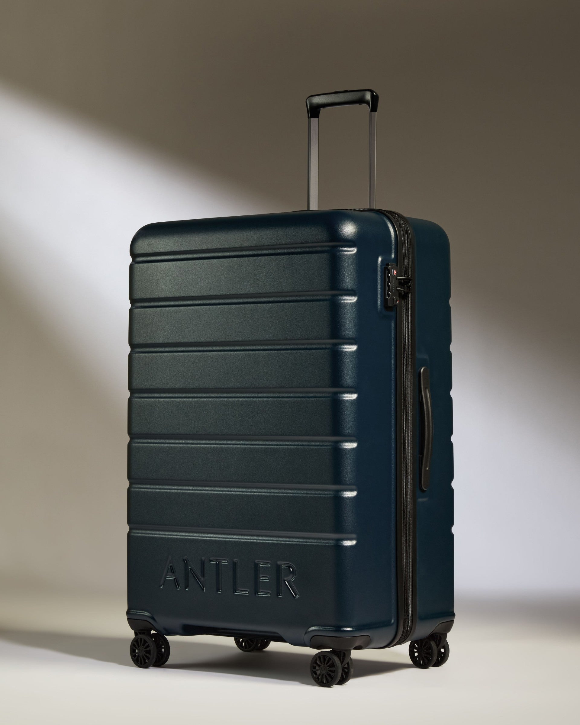 a blue suitcase with wheels
