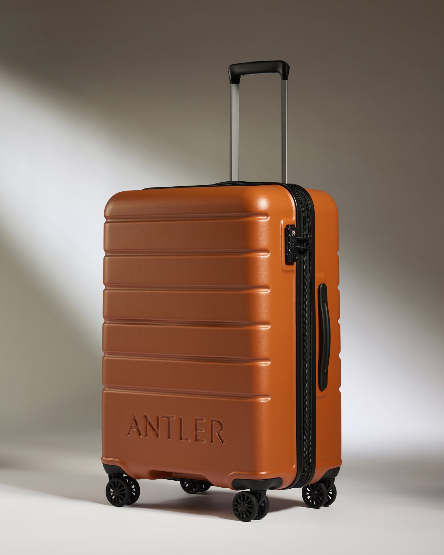 Expandable Carry-on Luggage Set in Amber - Logo