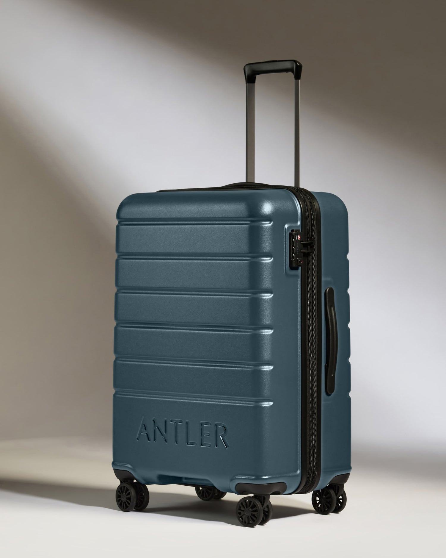 Medium Luggage in Blue Grey - Logo