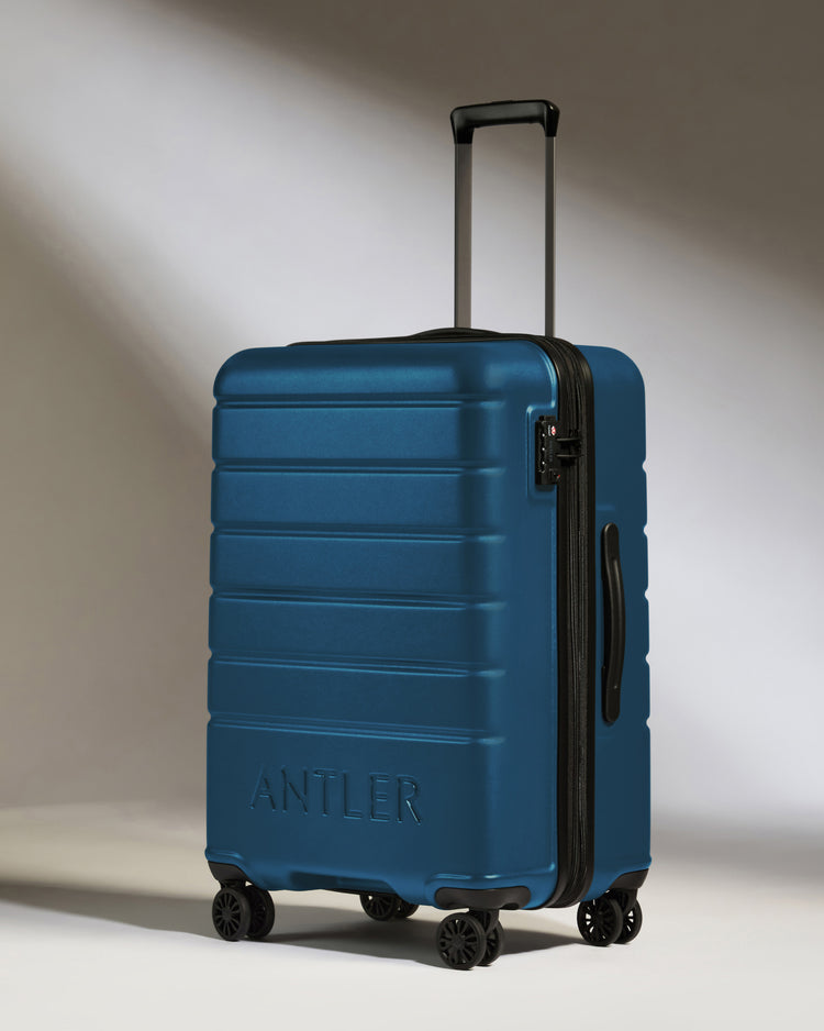 Medium Luggage in Bold Blue - Logo
