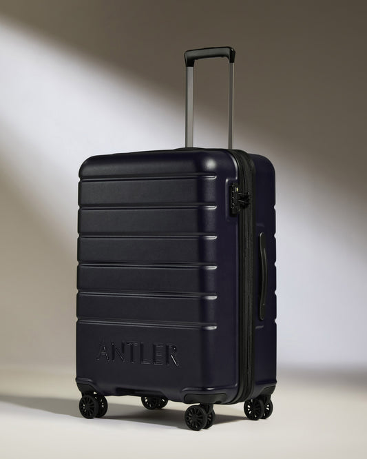 Medium Luggage in Dark Purple - Logo