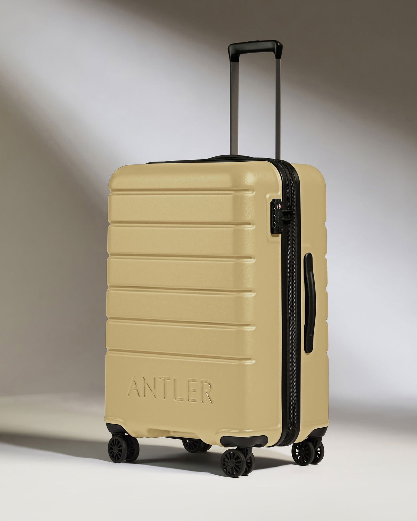 Expandable Carry-on Luggage Set in Dark Sand - Logo