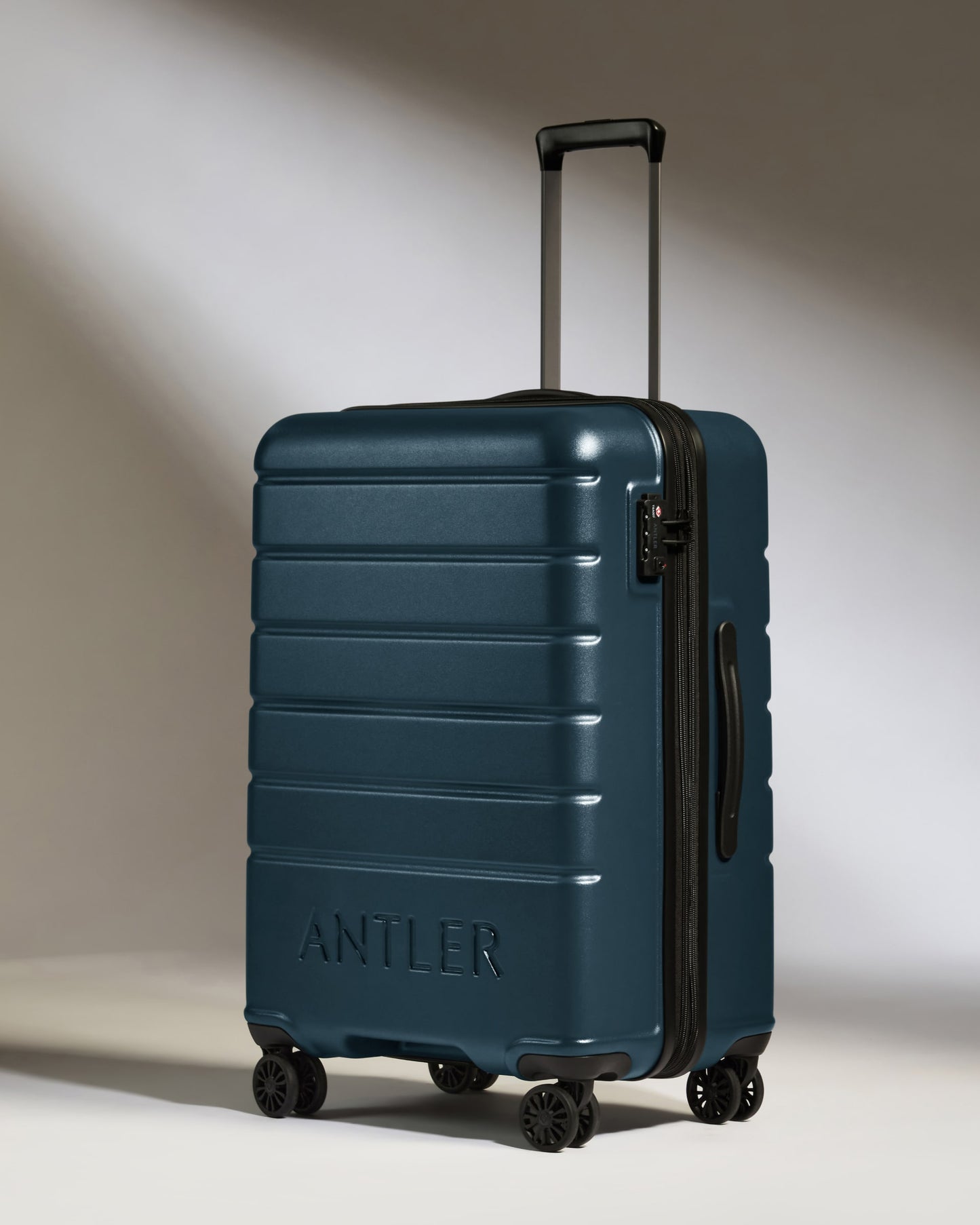 Medium Luggage in Mid Blue - Logo