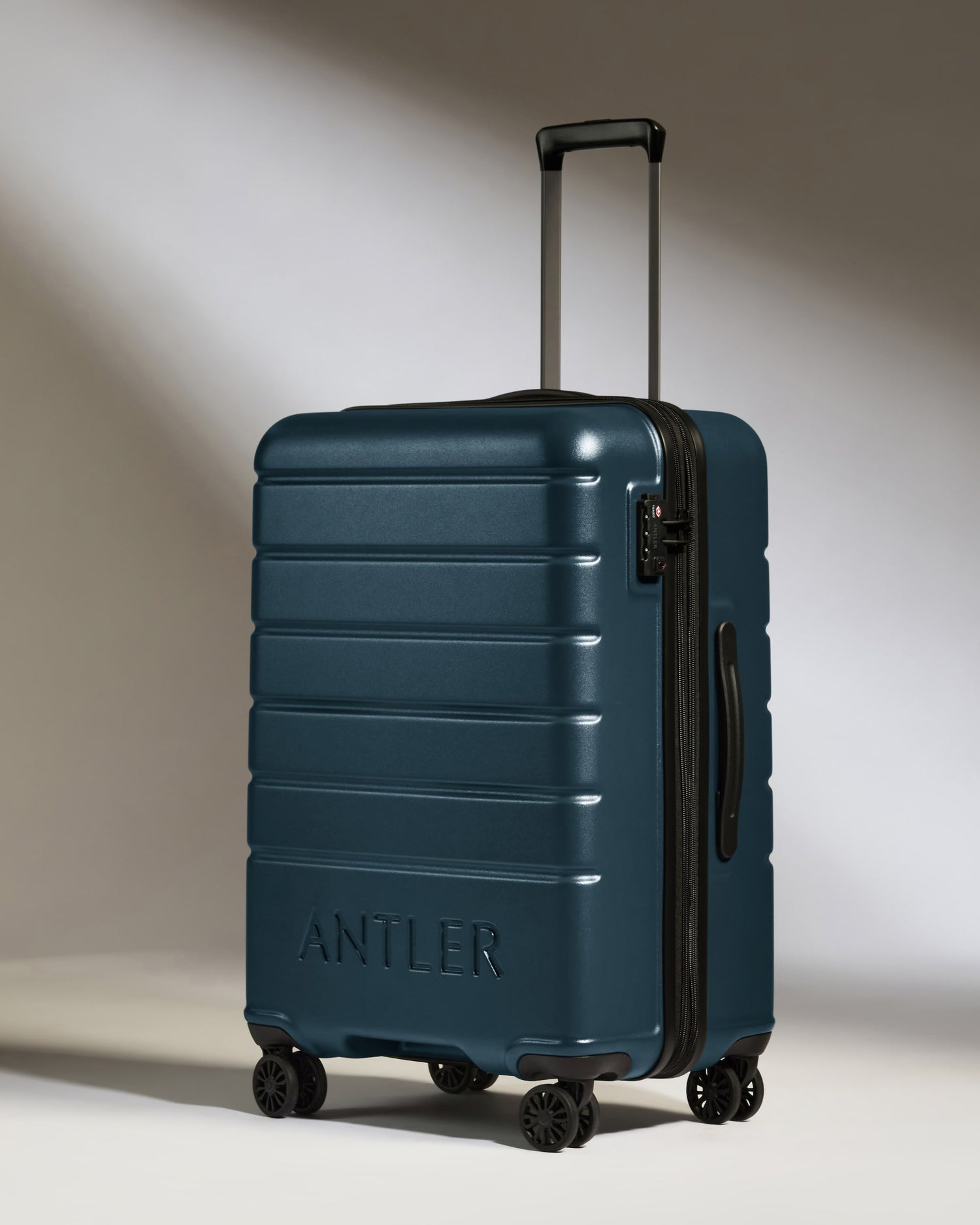 Medium Luggage in Mid Blue - Logo