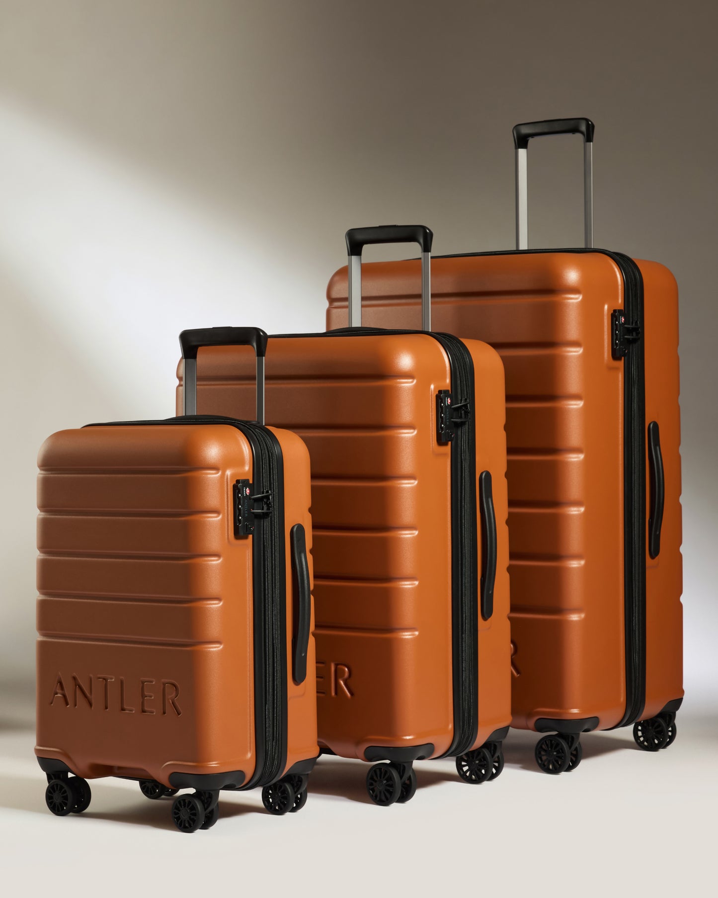 Expandable Carry-on Luggage Set in Amber - Logo