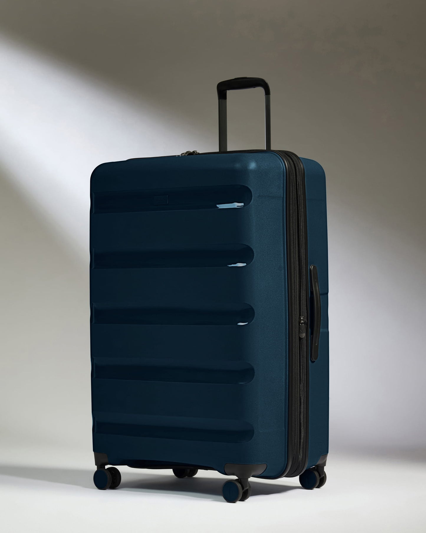 Large Luggage in Midnight Blue - Logo Stripe