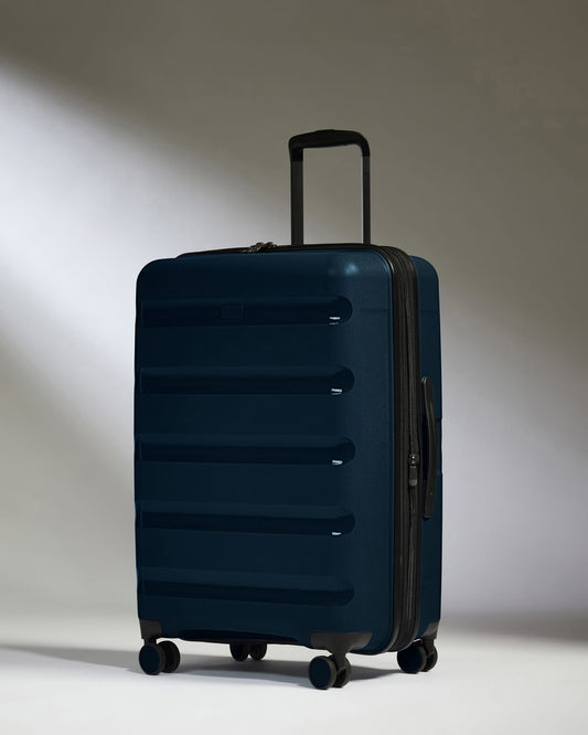 Medium Luggage in Midnight Blue - Logo Stripe