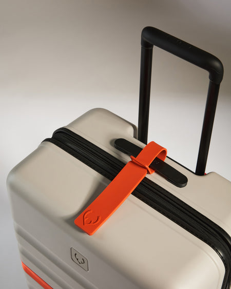 Antler luggage tag in coral