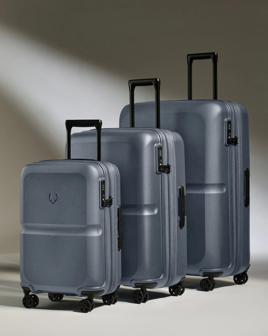 a group of luggage on wheels