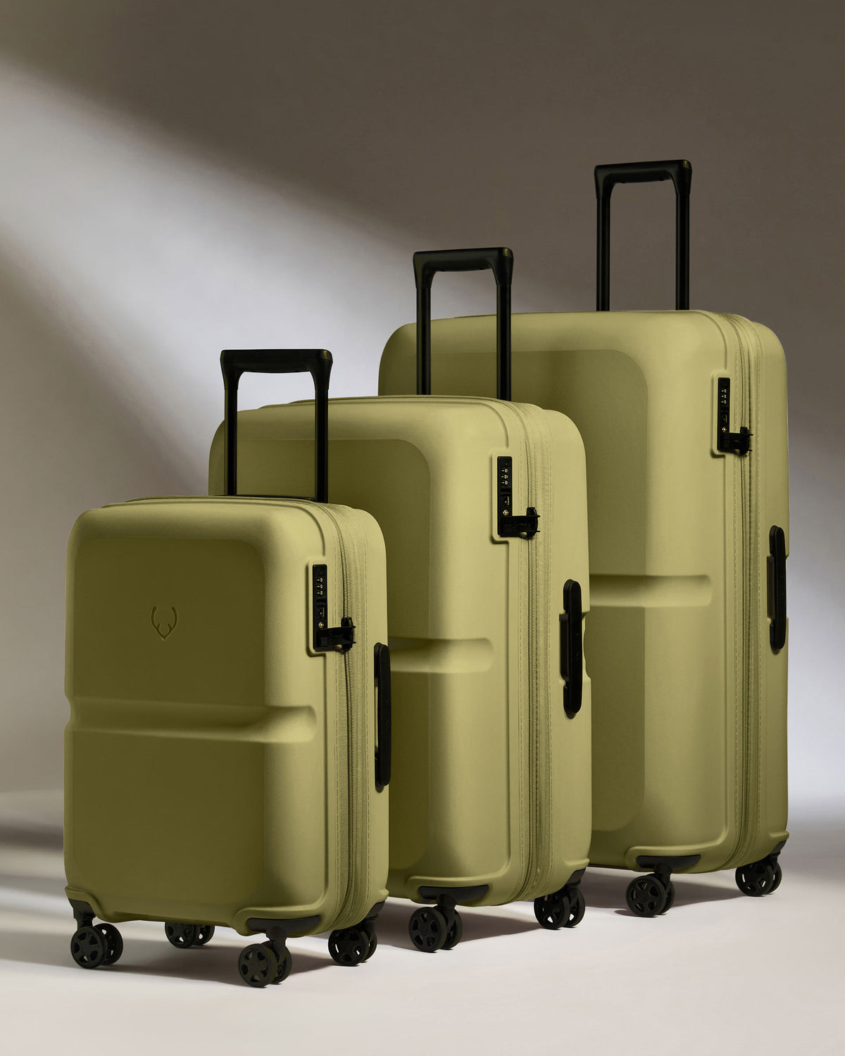 a group of luggage on wheels