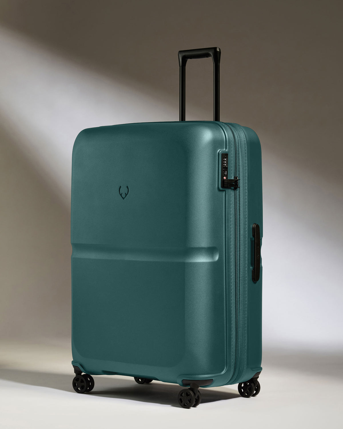 a blue suitcase with wheels