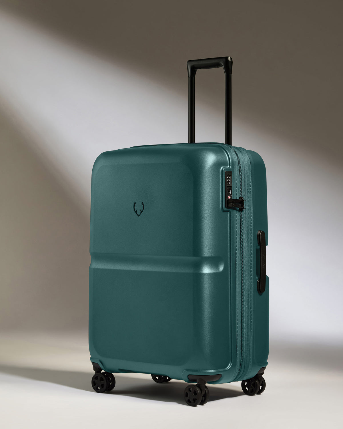 a blue suitcase with wheels