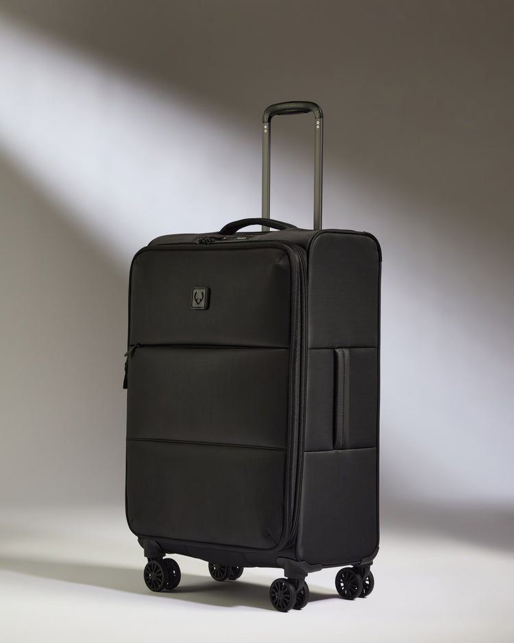 Lightest Medium Luggage in Black - Soft Stripe 2.0