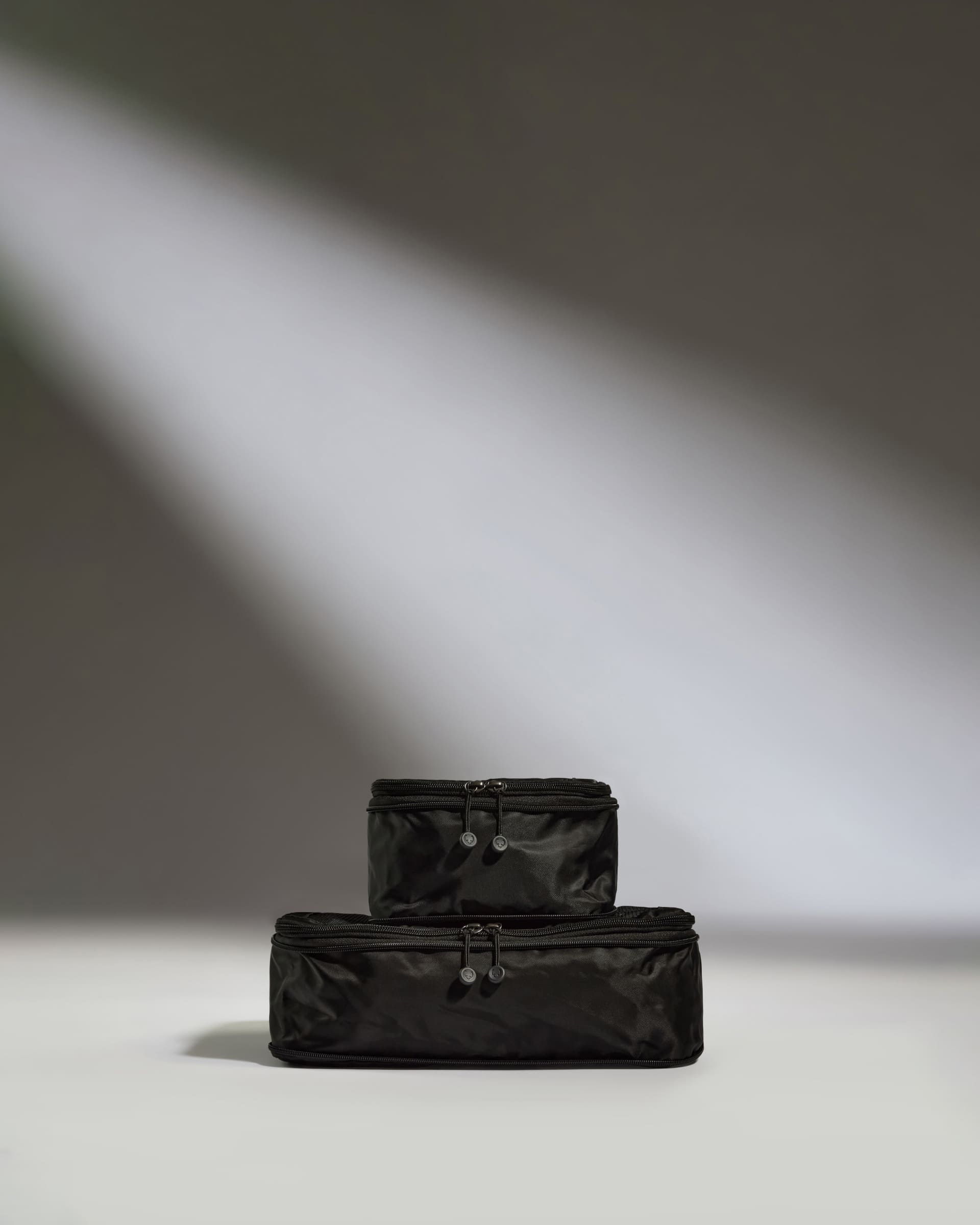 a black bag with zippers