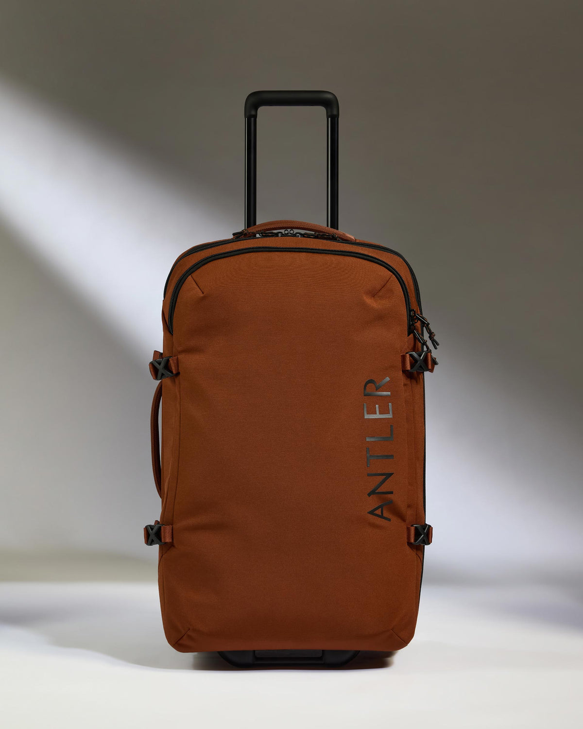 a brown suitcase with handle