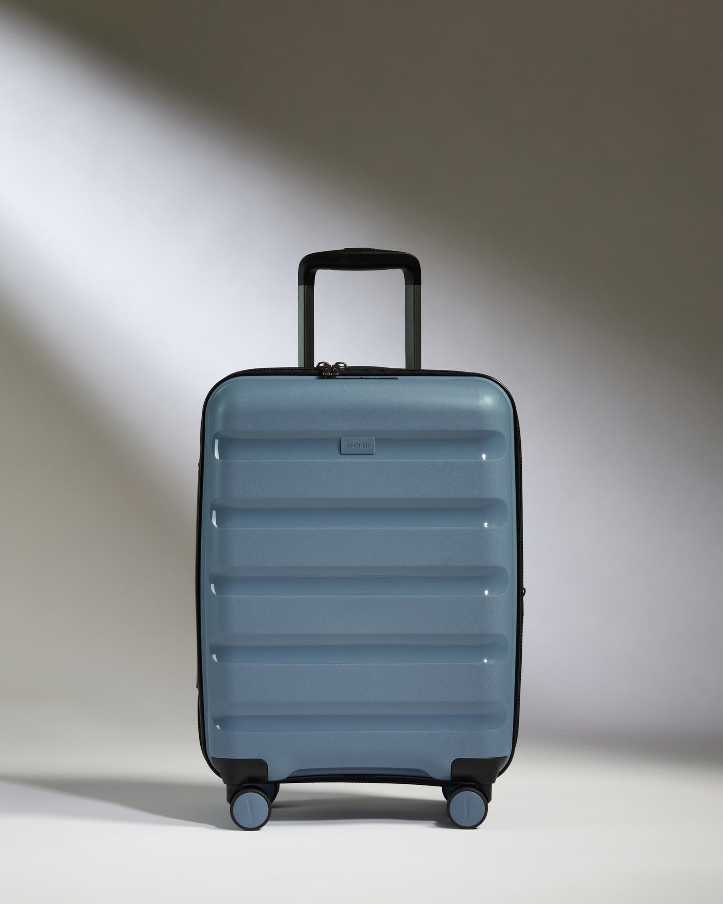 Expandable Carry-on Luggage in Light Blue - Logo Stripe