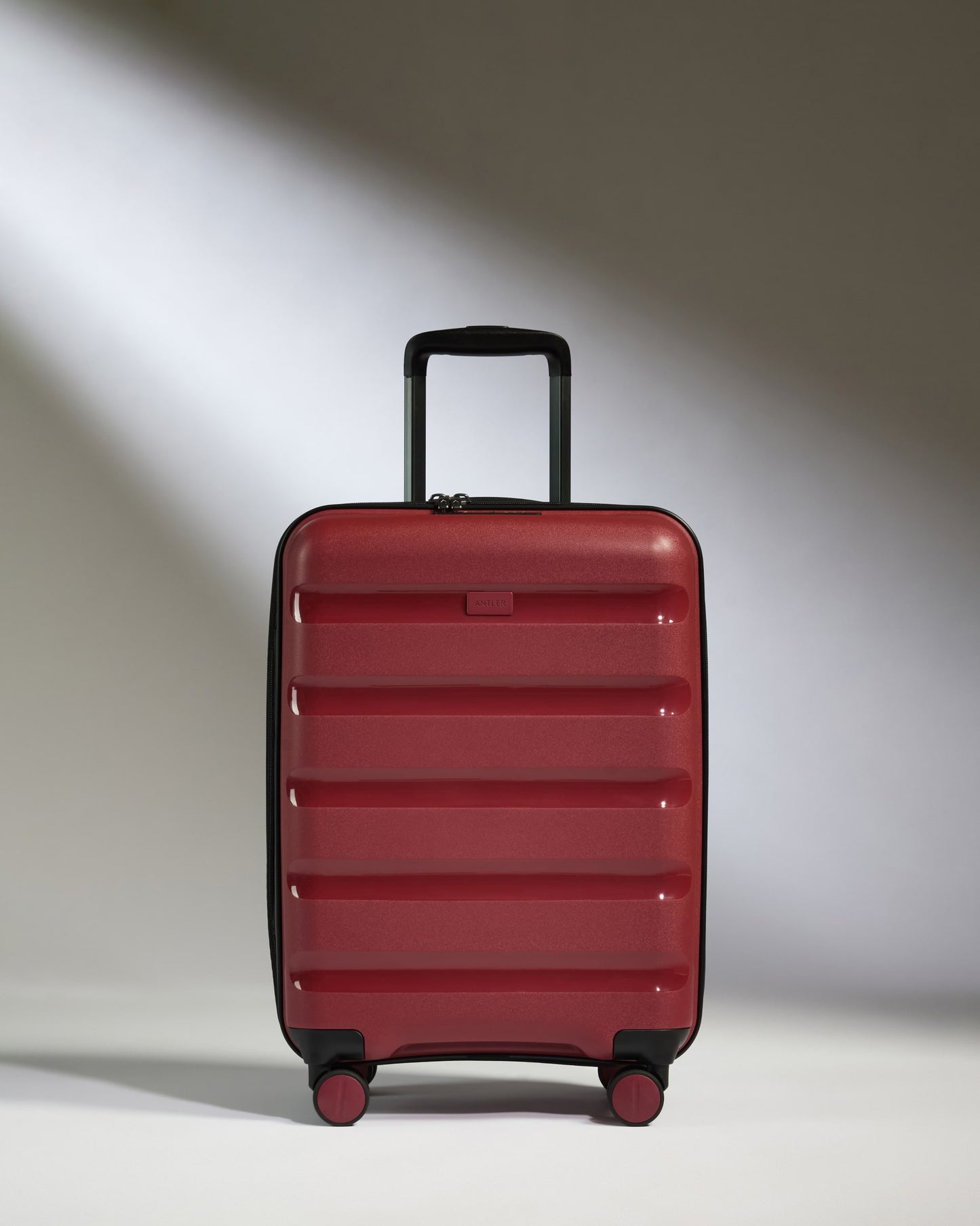 Expandable Carry-on Luggage in Soft Red - Logo Stripe