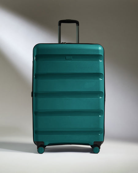 Large Luggage in Deep Teal - Logo Stripe