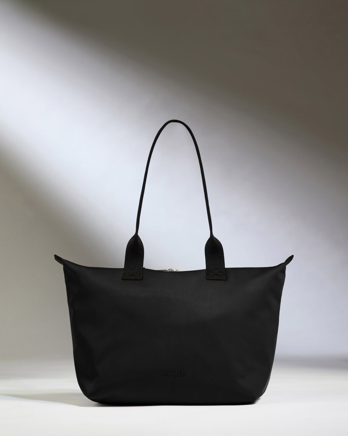 a black bag with a handle