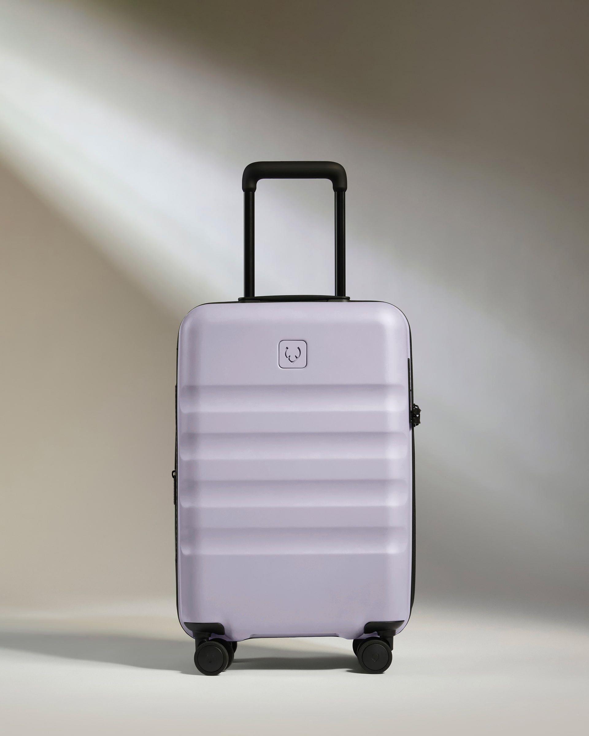 a suitcase with wheels and handle