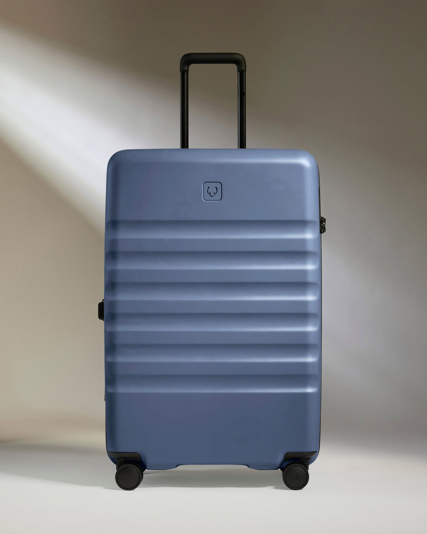 Large Luggage in Ocean Blue - Icon Stripe