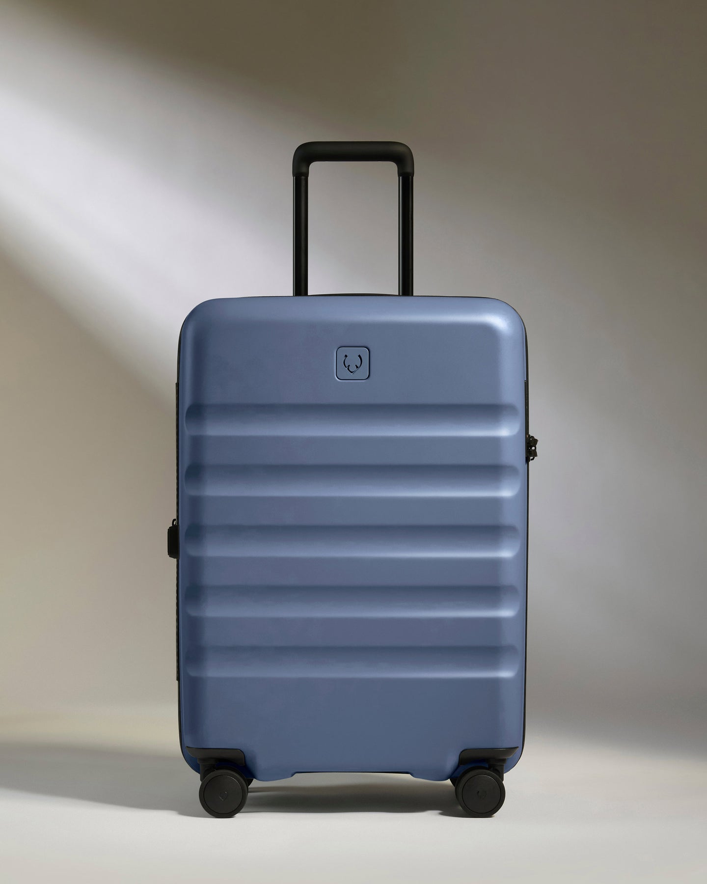 Medium Luggage in Ocean Blue - Icon Stripe