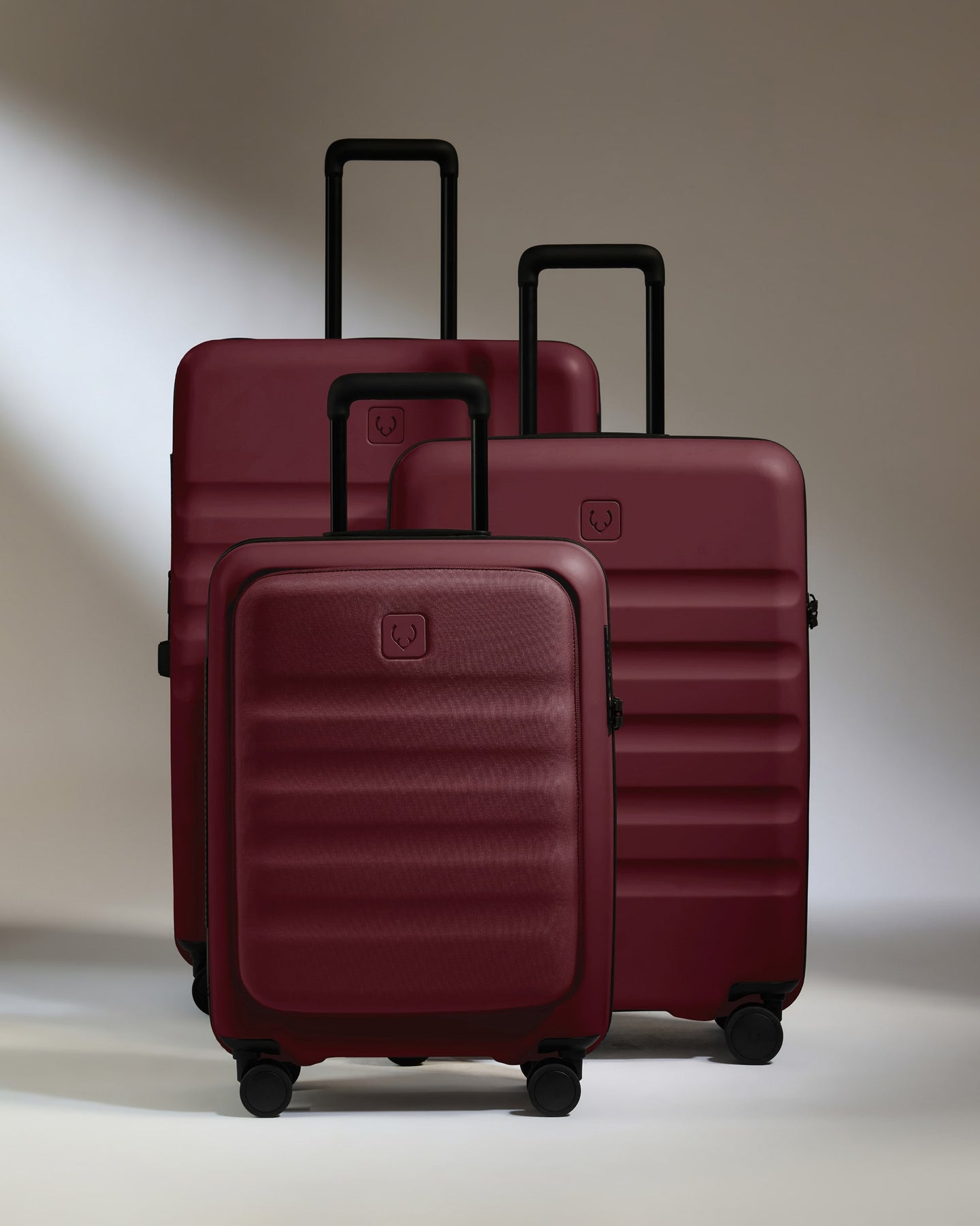 a group of luggage on wheels