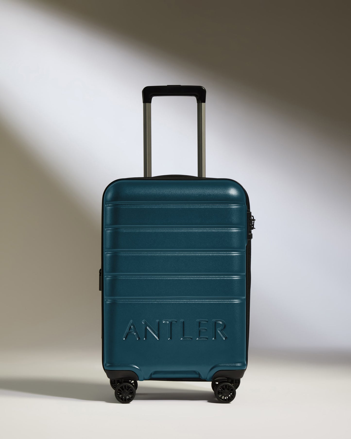 a blue suitcase with handle