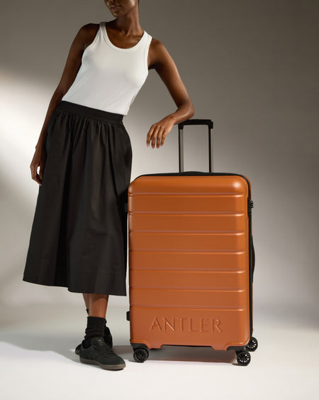 Large Suitcase in Amber - Logo