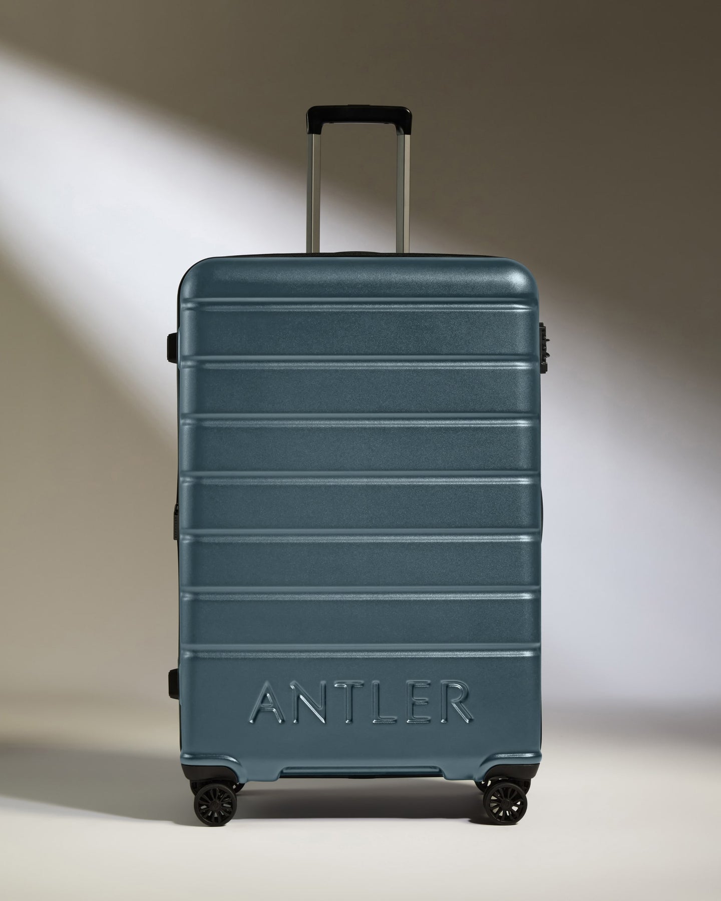 Large Luggage in Blue Grey - Logo