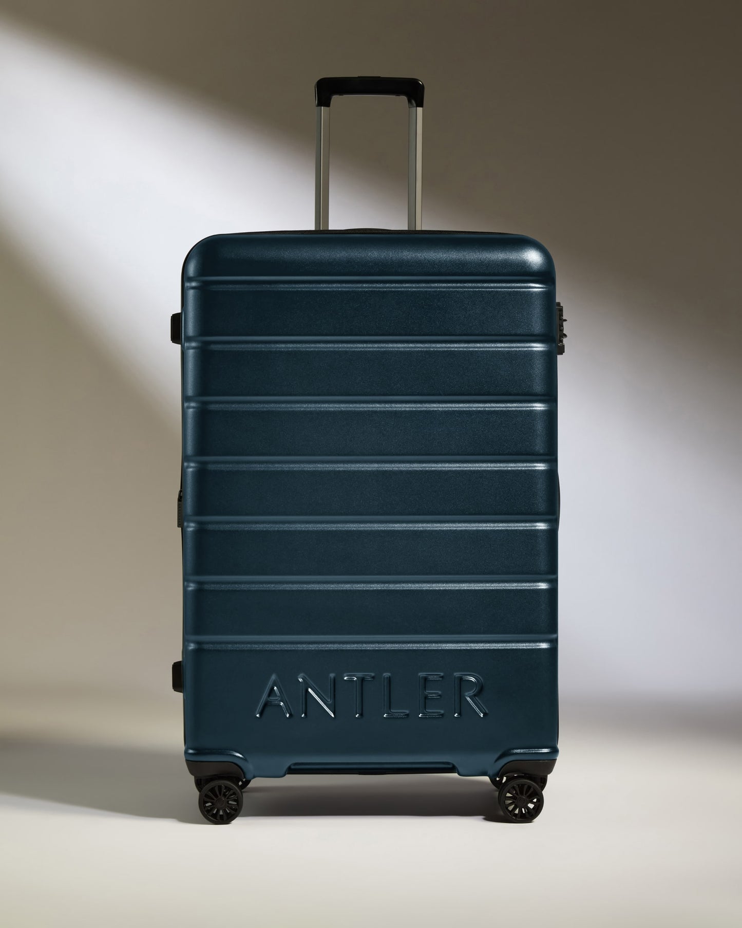 Large Luggage in Mid Blue - Logo
