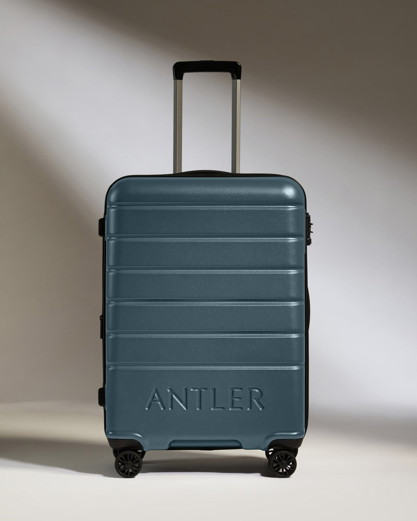 Medium Luggage in Blue Grey - Logo