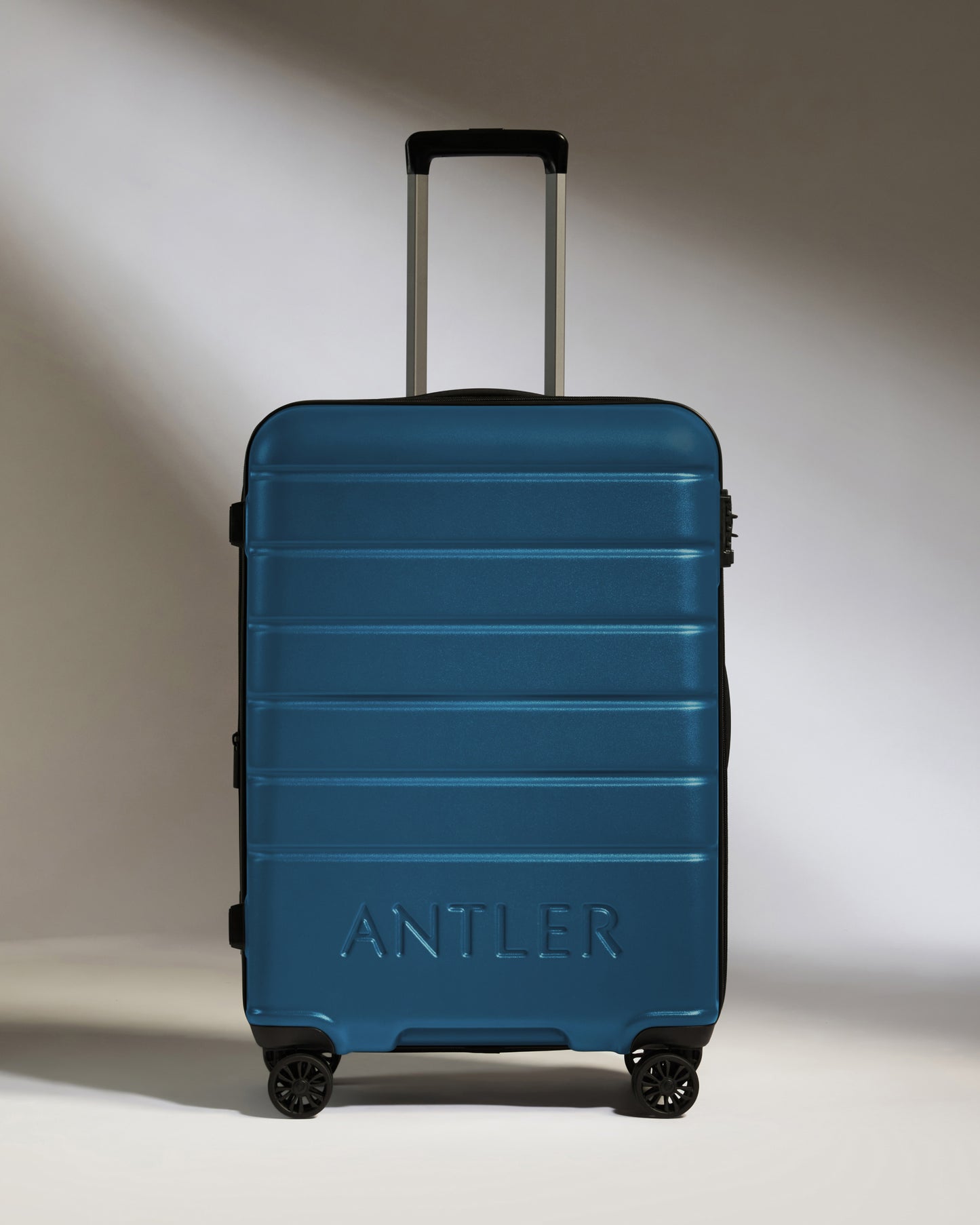 Medium Luggage in Bold Blue - Logo