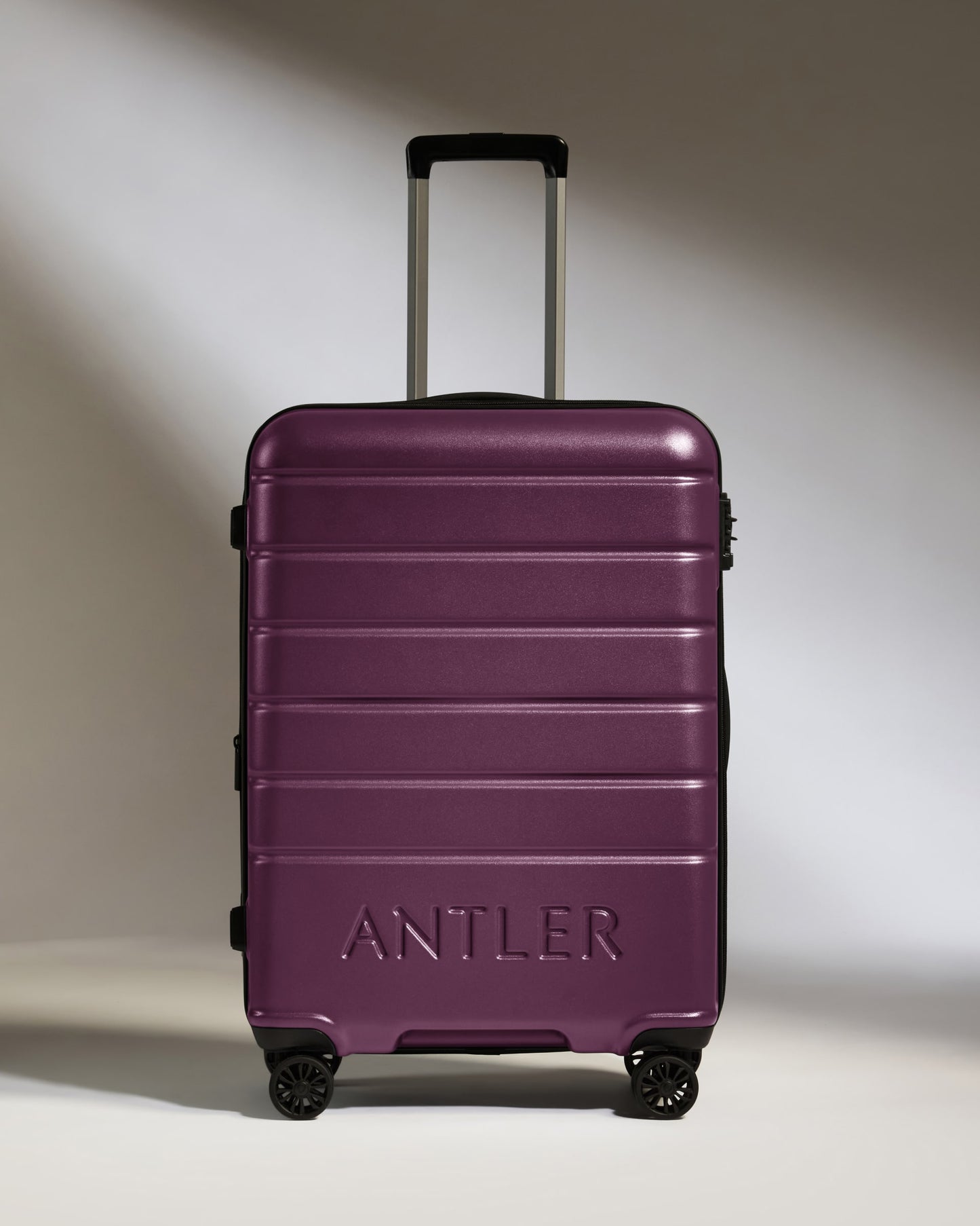 Medium Luggage in Dark Heather Purple - Logo