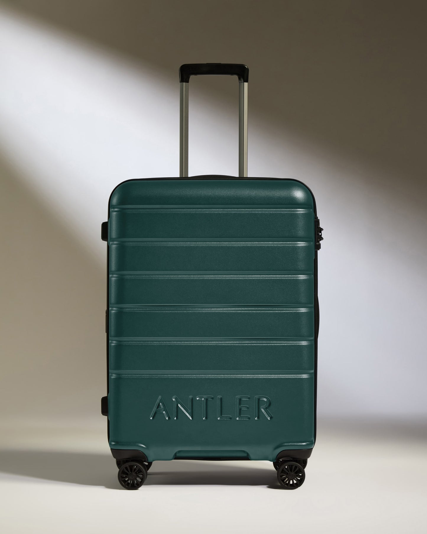Medium Luggage in Dark Teal - Logo