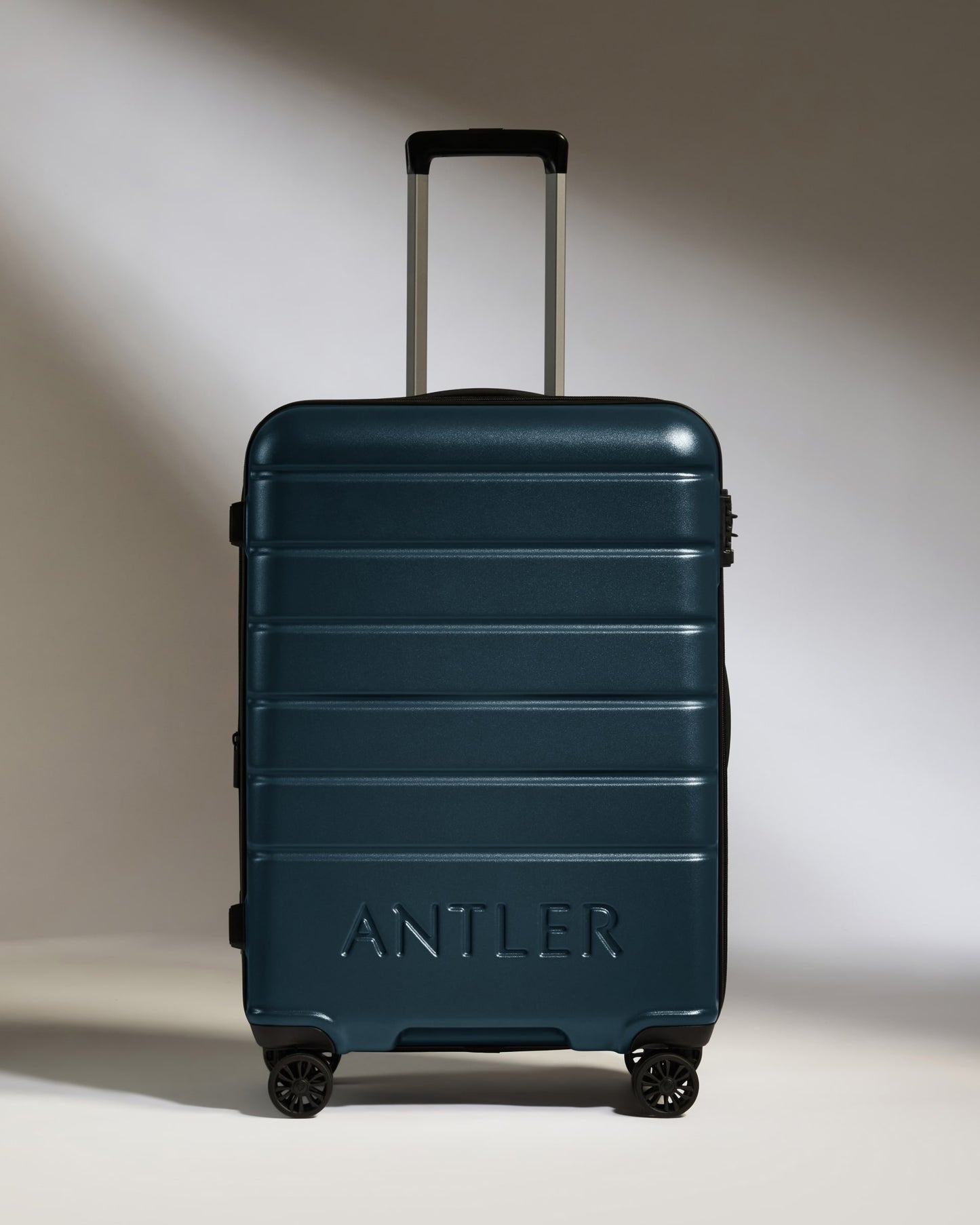 Medium Luggage in Mid Blue - Logo