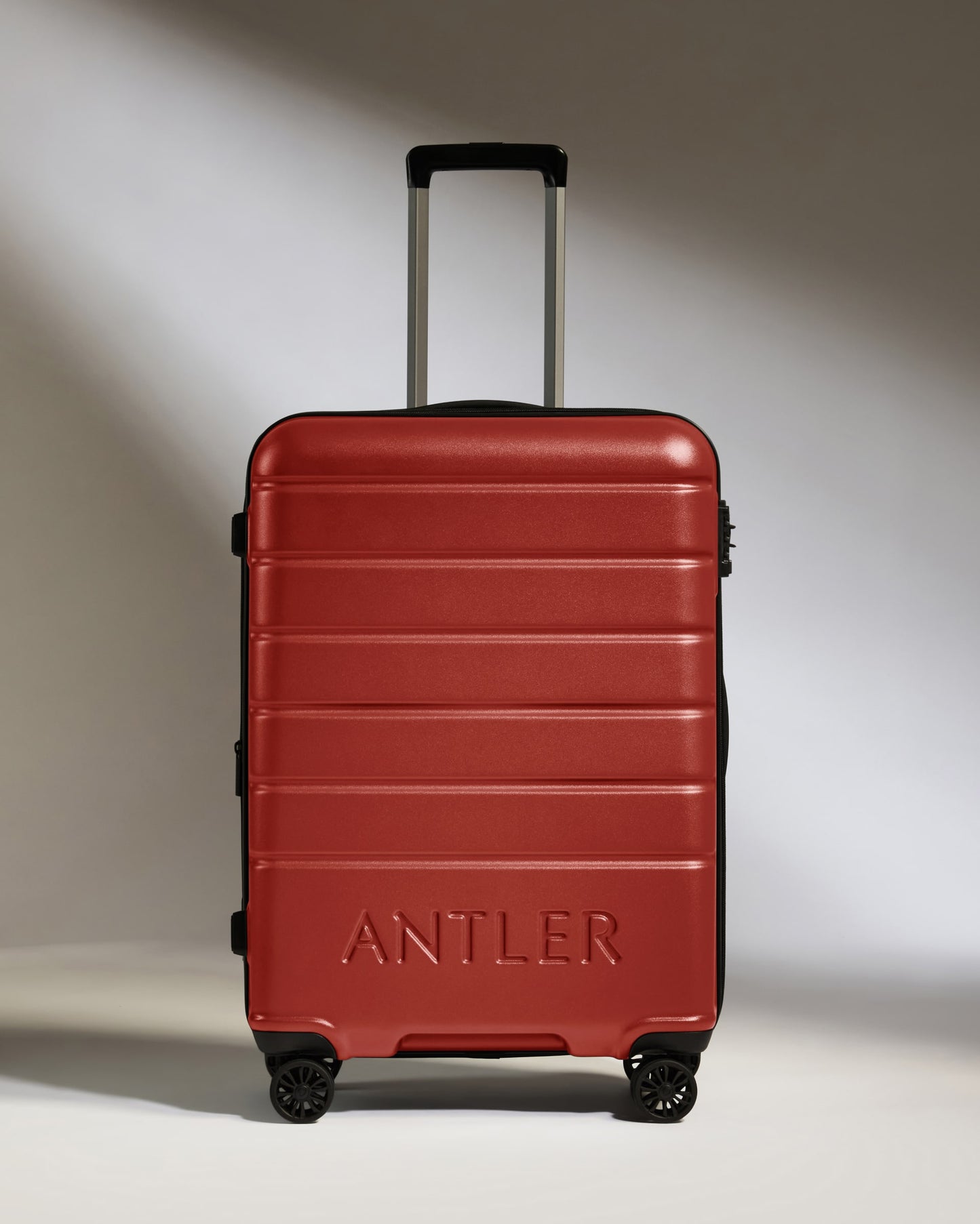 Medium Luggage in Red Orange - Logo