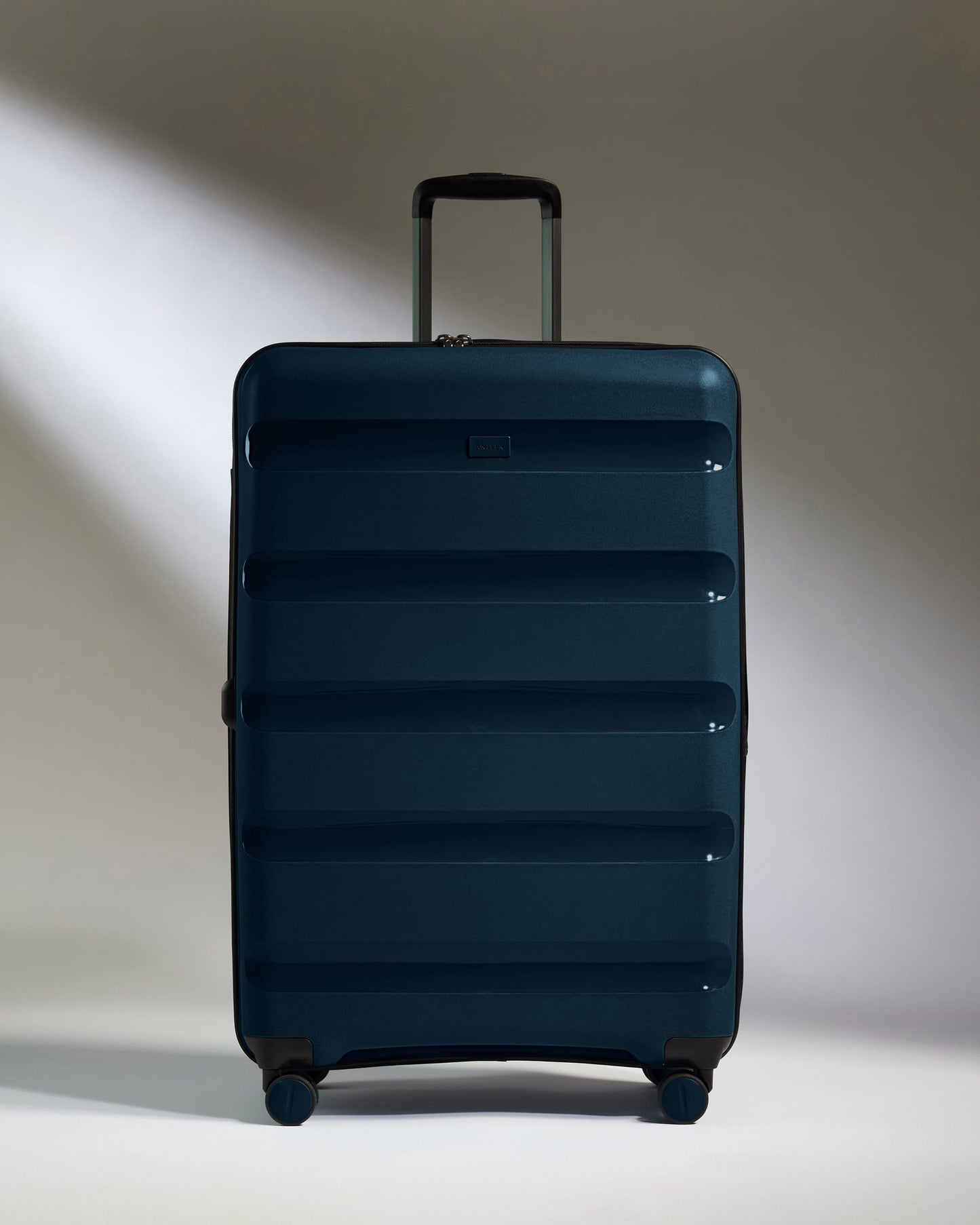 Large Luggage in Midnight Blue - Logo Stripe