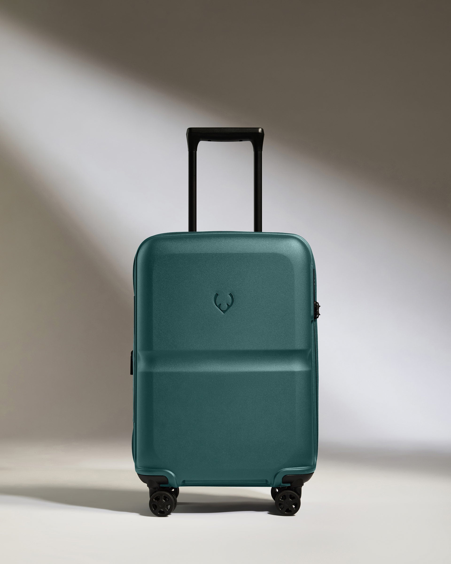 a blue suitcase with wheels