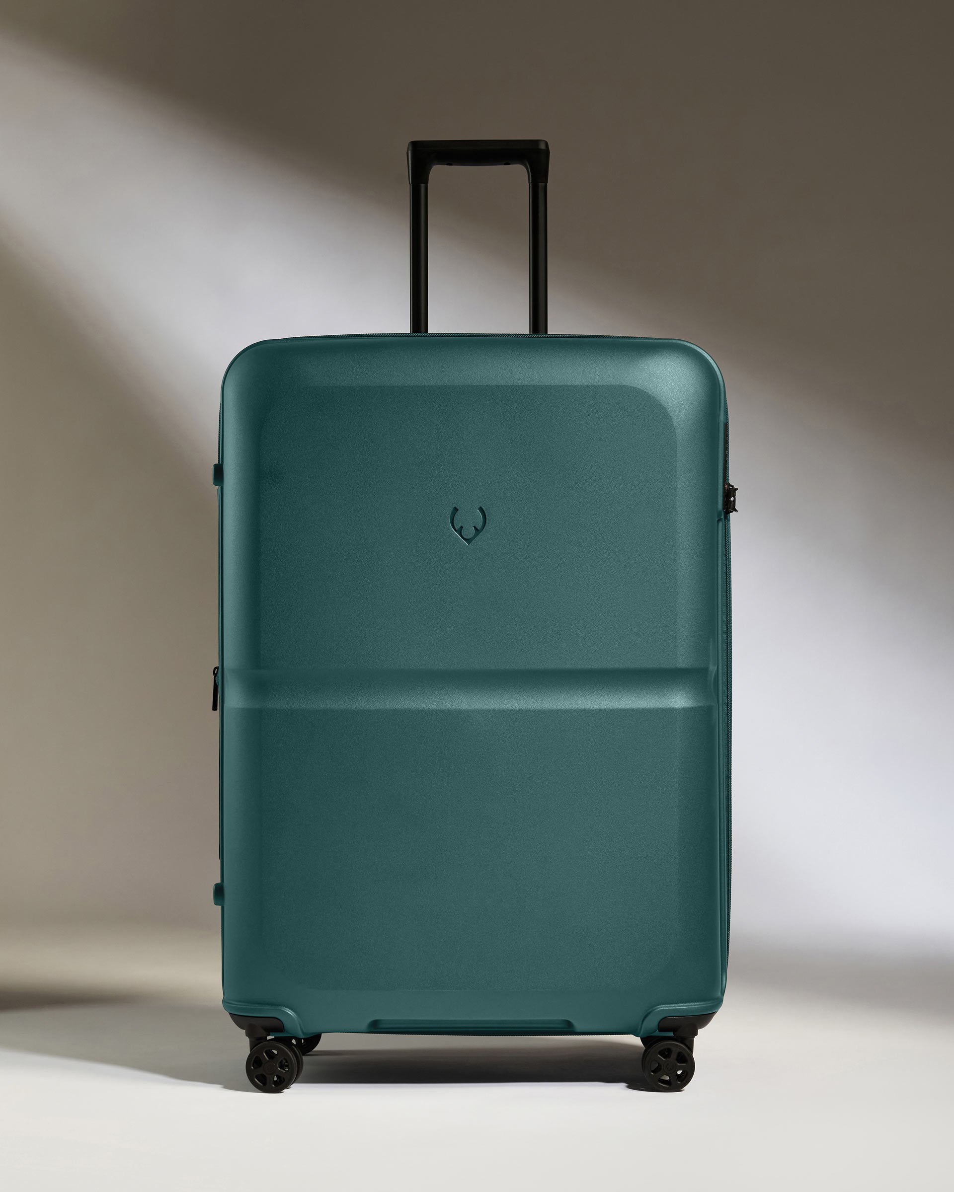 a blue suitcase with wheels