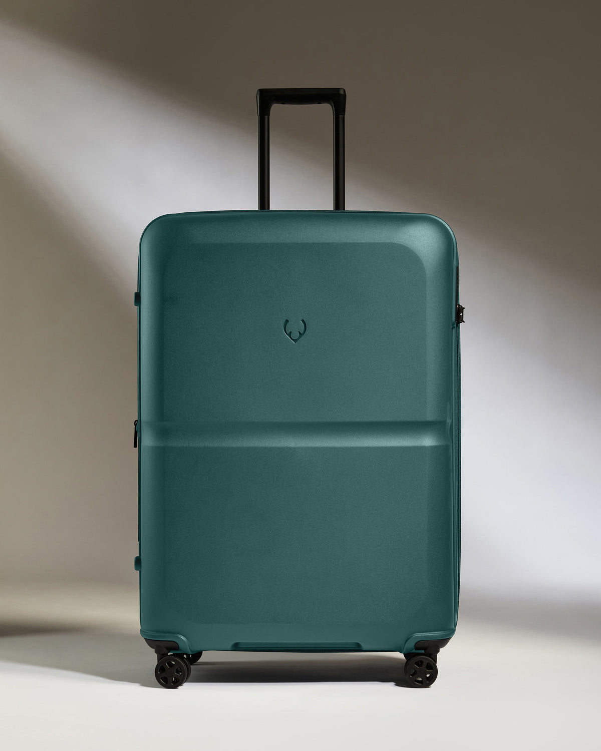 a blue suitcase with wheels