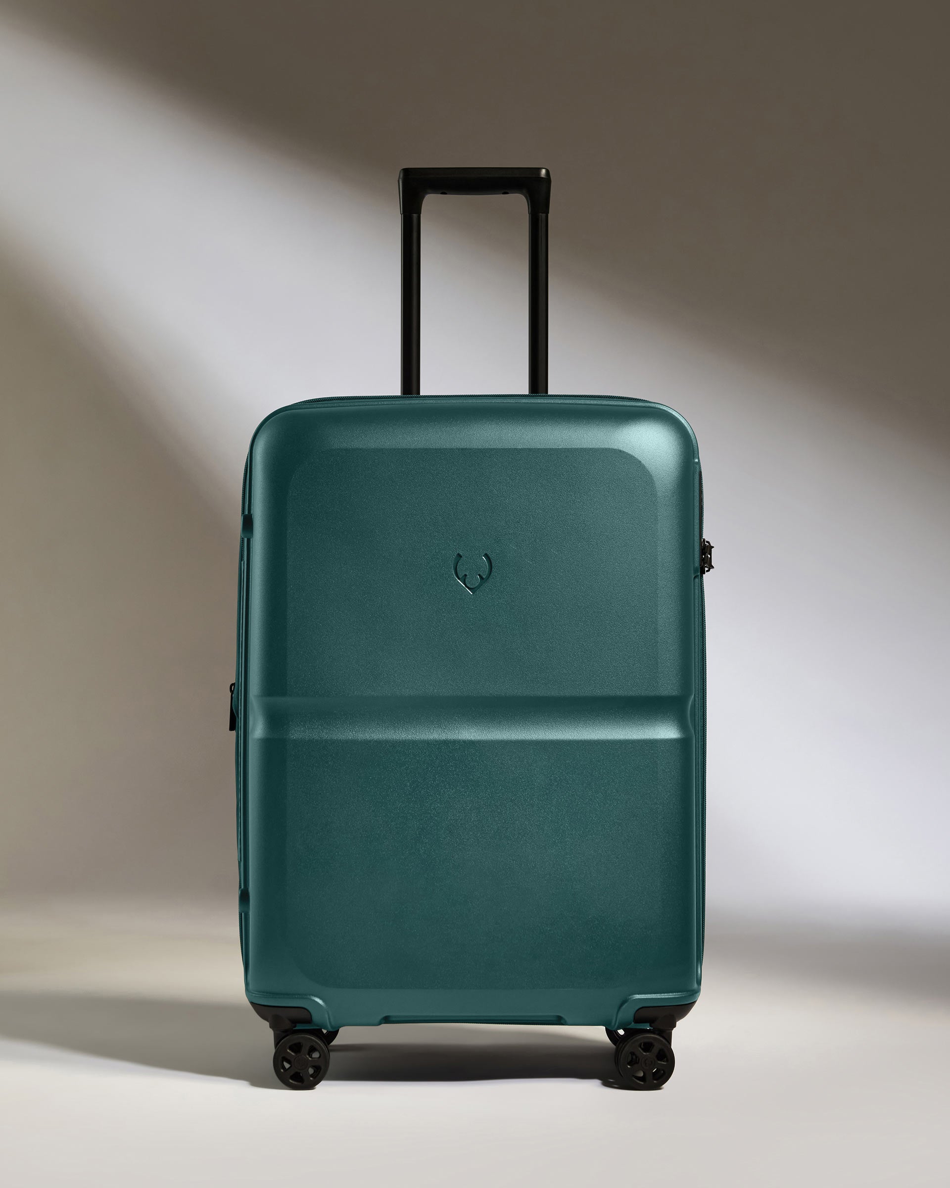 a suitcase with wheels and handle