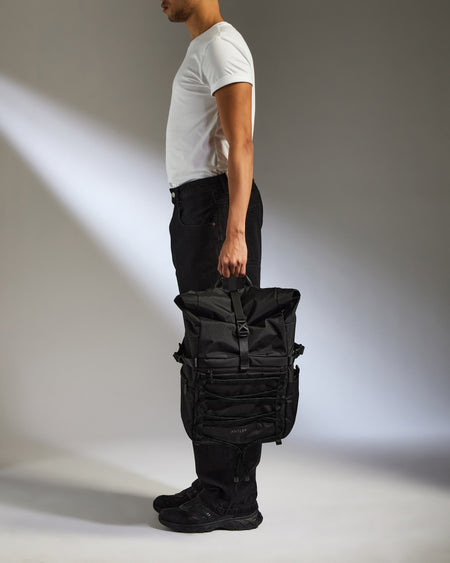 Discovery Roll Top Backpack in Black