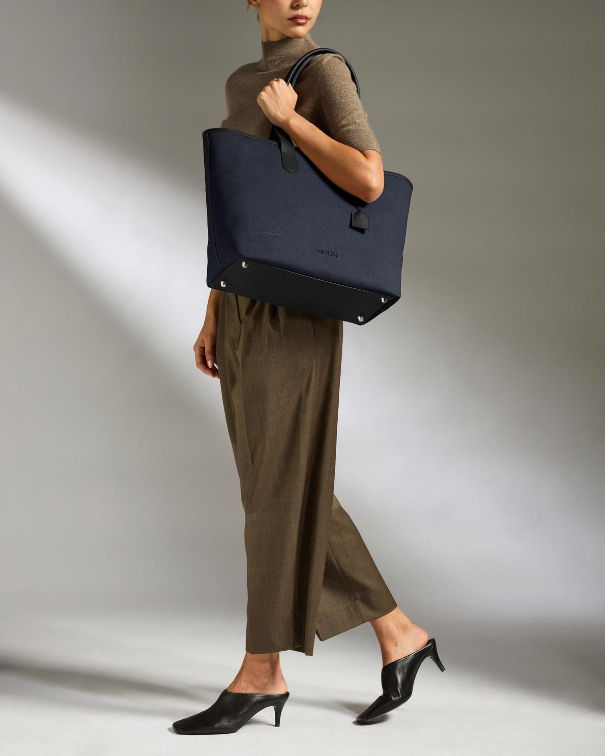 a woman holding a bag